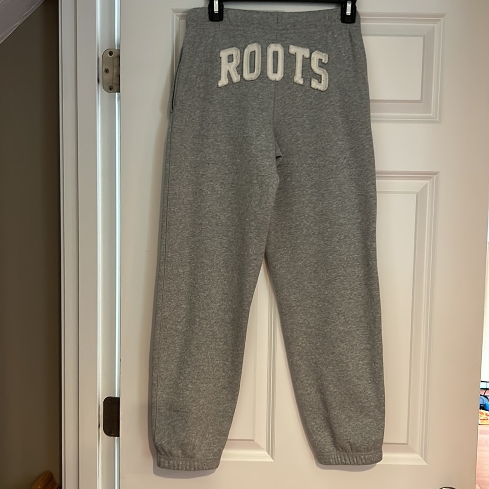 ROOTS girls sweatpants. Gray glitter color. Size 12. Great condition!
